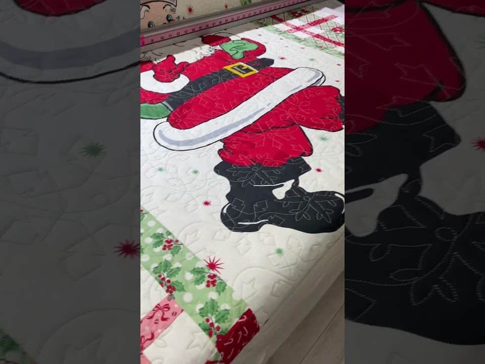 Marie’s “Here Comes Santa Claus” Quilt - Longarm quilted by Maynard Longarm Quilting