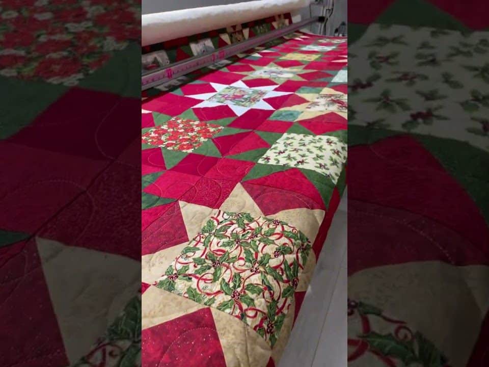 Lois’s “Christmas Wedding” quilt - Longarm quilted by Maynard Longarm Quilting
