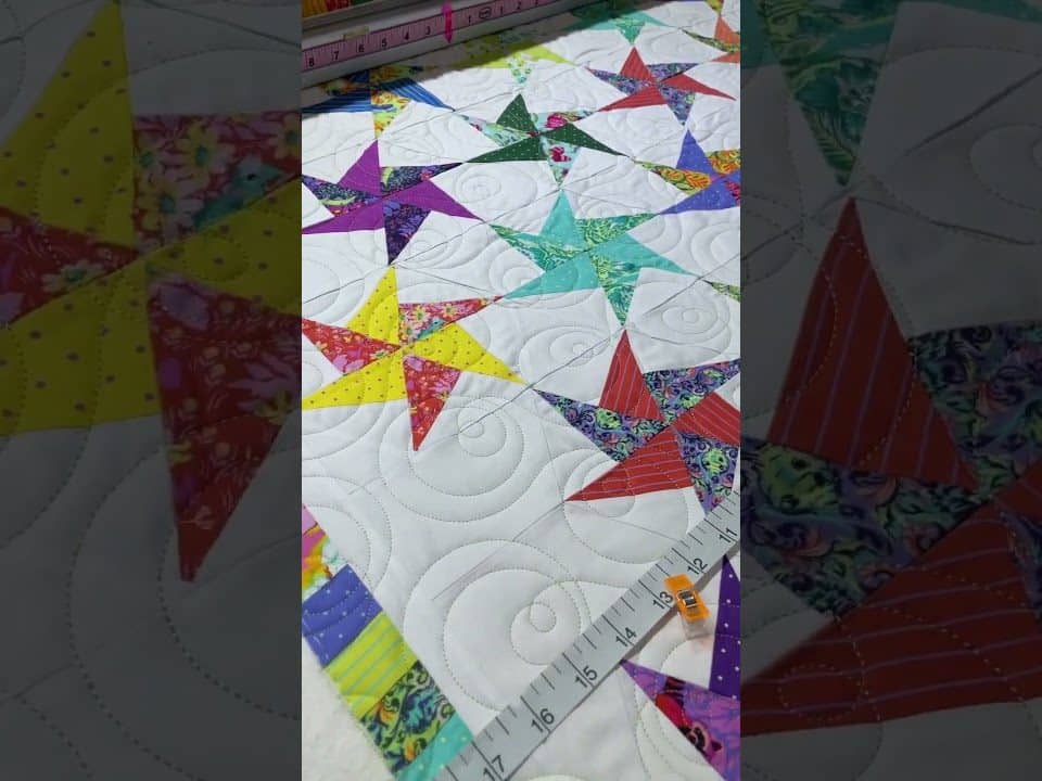 Jeanne’s “Tula PinWheel” Quilt - Longarm quilted by Maynard Longarm Quilting