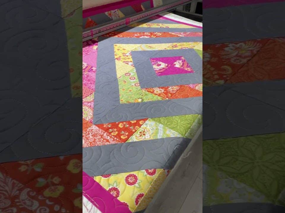 Karen’s 1/2 Sq Triangle quilt - Longarm quilted by Maynard Longarm Quilting