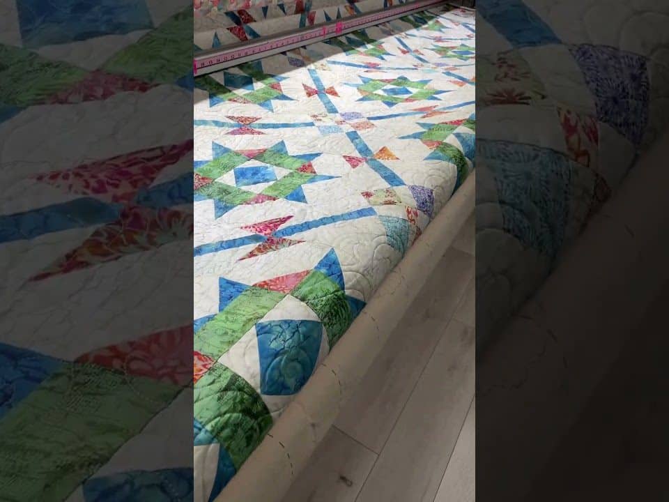 Sue’s “Jason Yenter” Mystery quilt - Longarm quilted by Maynard Longarm Quilting