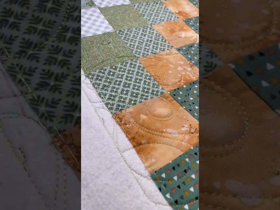 Helen’s Around the World quilt - Longarm quilted by Maynard Longarm Quilting