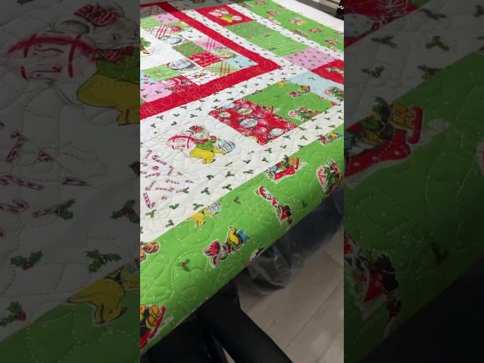 Cathy’s “Christmas” quilt - Longarm quilted by Maynard Longarm Quilting