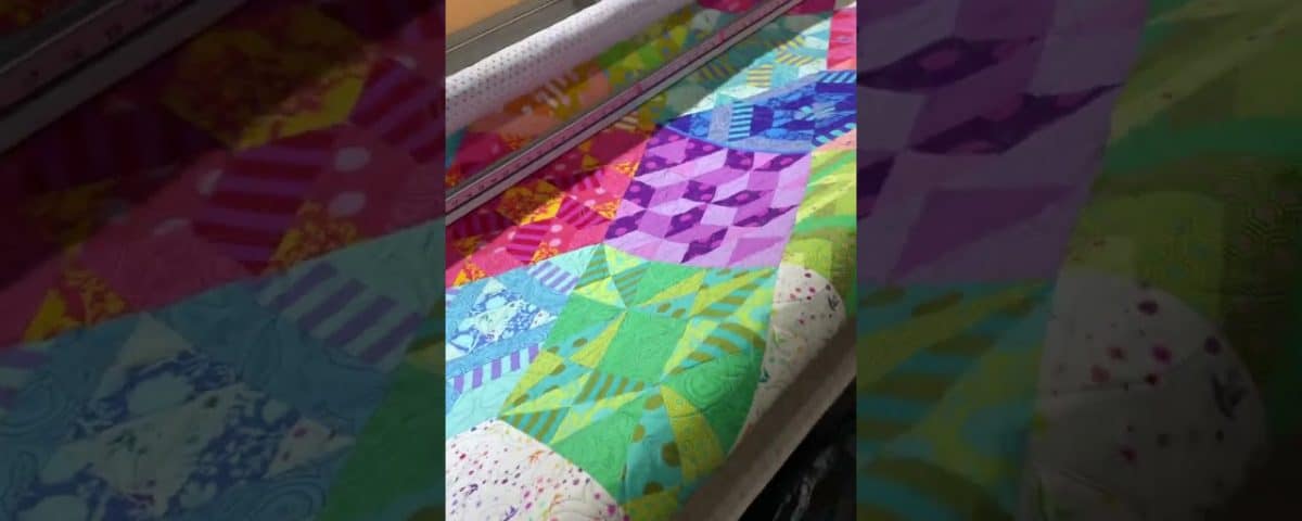Vicki’s “Nebula with Tula Pink fabrics” - Longarm quilted by Maynard Longarm Quilting