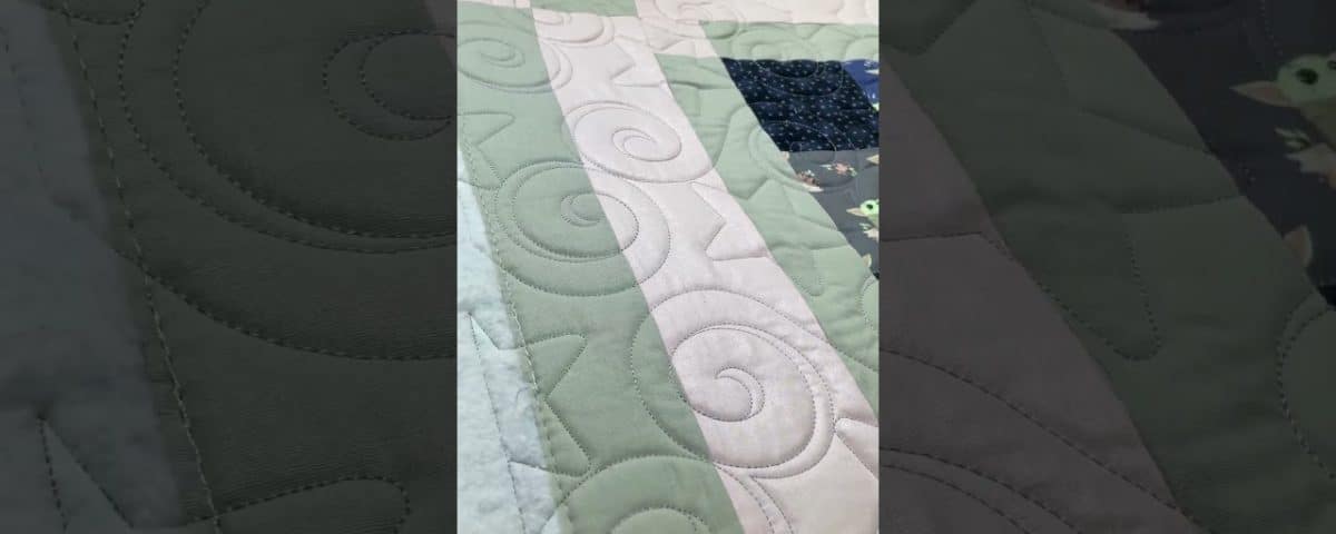 Joyce’s “Yoda” quilt - Longarm quilted by Maynard Longarm Quilting