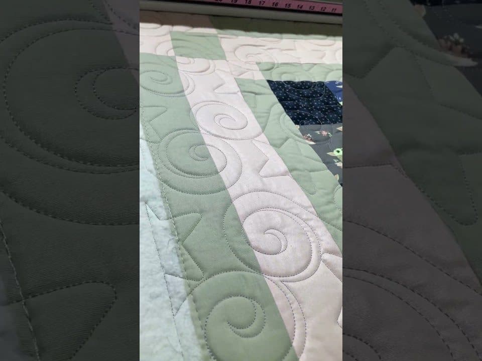 Joyce’s “Yoda” quilt - Longarm quilted by Maynard Longarm Quilting
