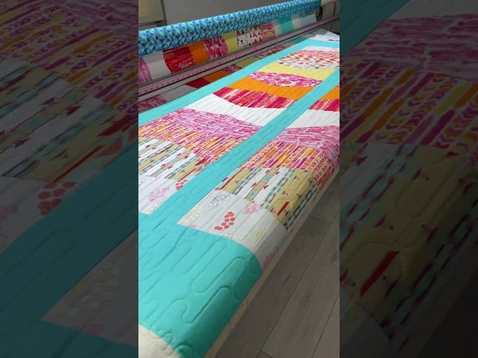 Donna’s “Tumbler” quilt - Longarm quilted by Maynard Longarm Quilting