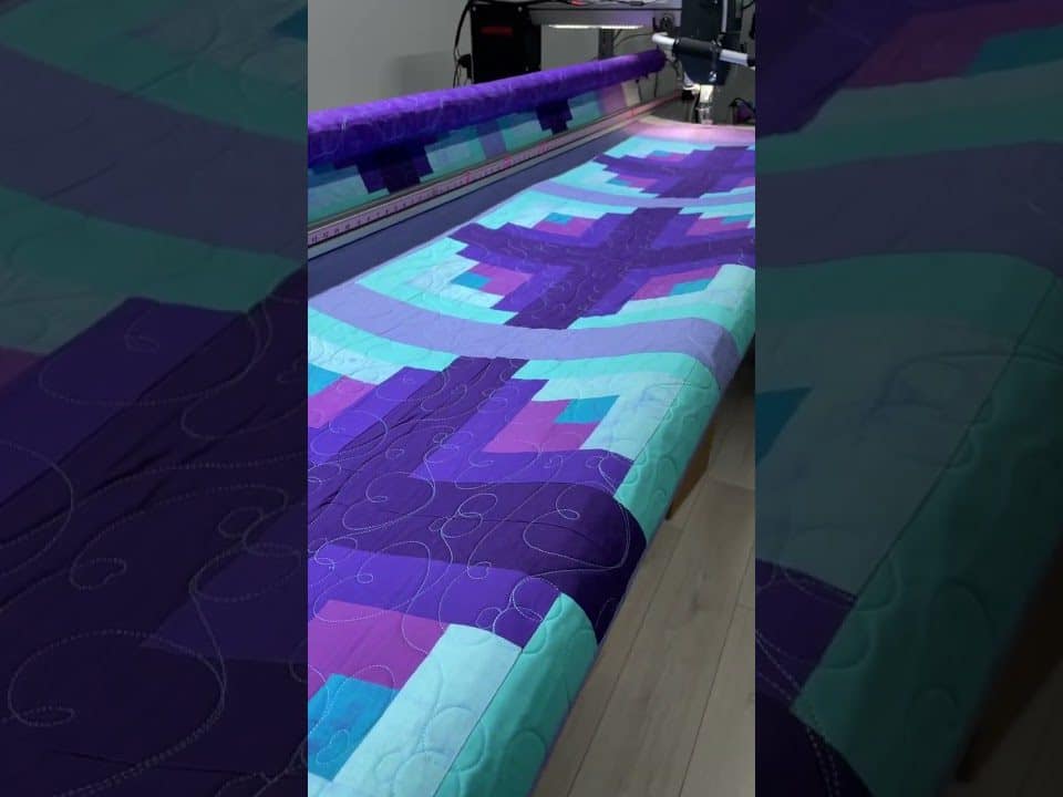 Dwight’s “Wedding” quilt - Longarm quilted by Maynard Longarm Quilting