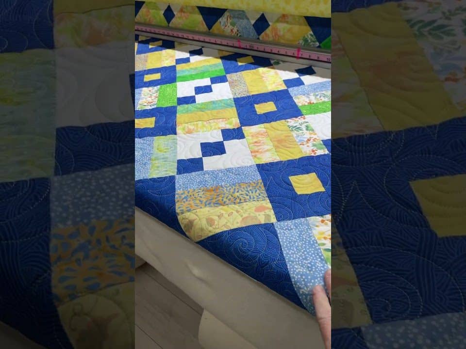 Karen’s “Step by Step” quilt - Longarm quilted by Maynard Longarm Quilting
