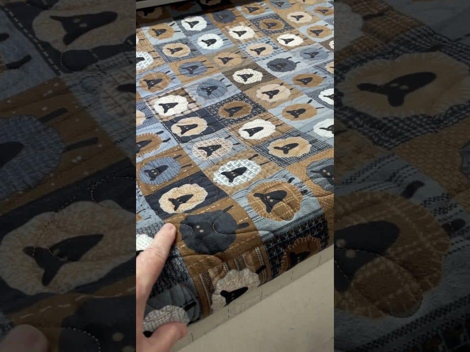 Paula’s “Sheep Panel” quilt - Longarm quilted by Maynard Longarm Quilting