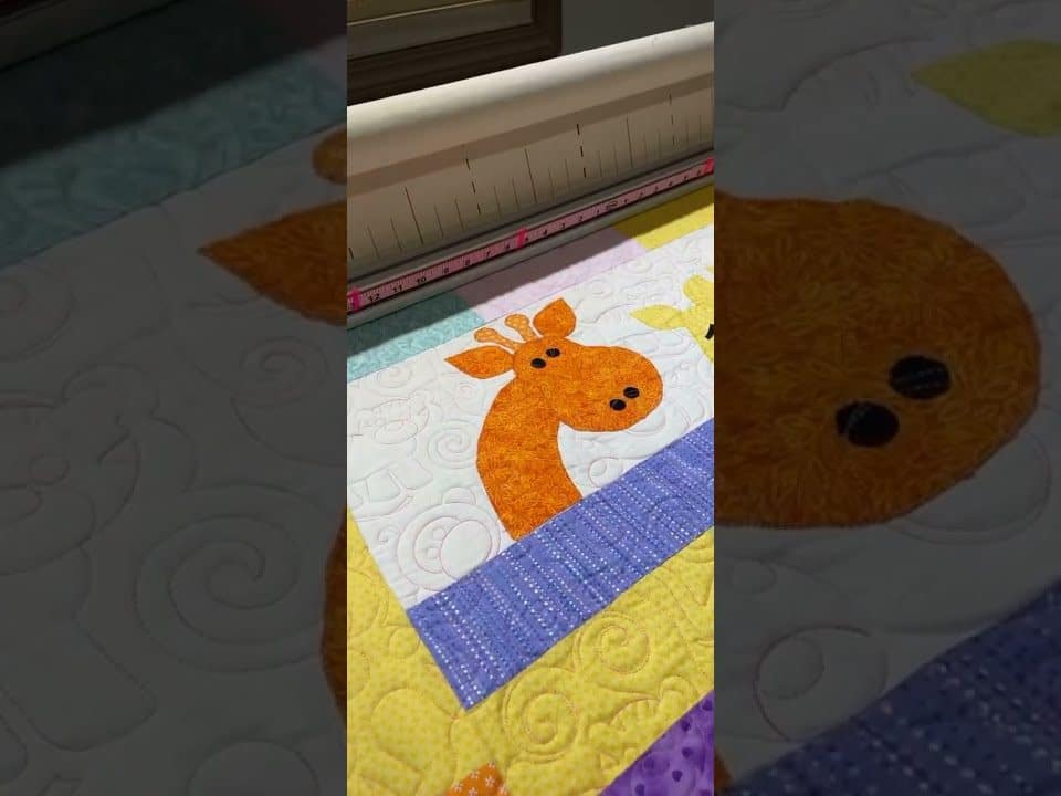 Sandy’s “Baby Zoo Animals” quilt - Longarm quilted by Maynard Longarm Quilting