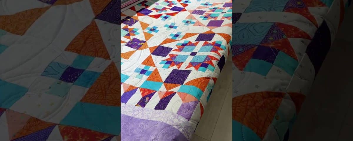 Dawn’s “Bonny Hunter Scrappy” quilt - Longarm quilted by Maynard Longarm Quilting