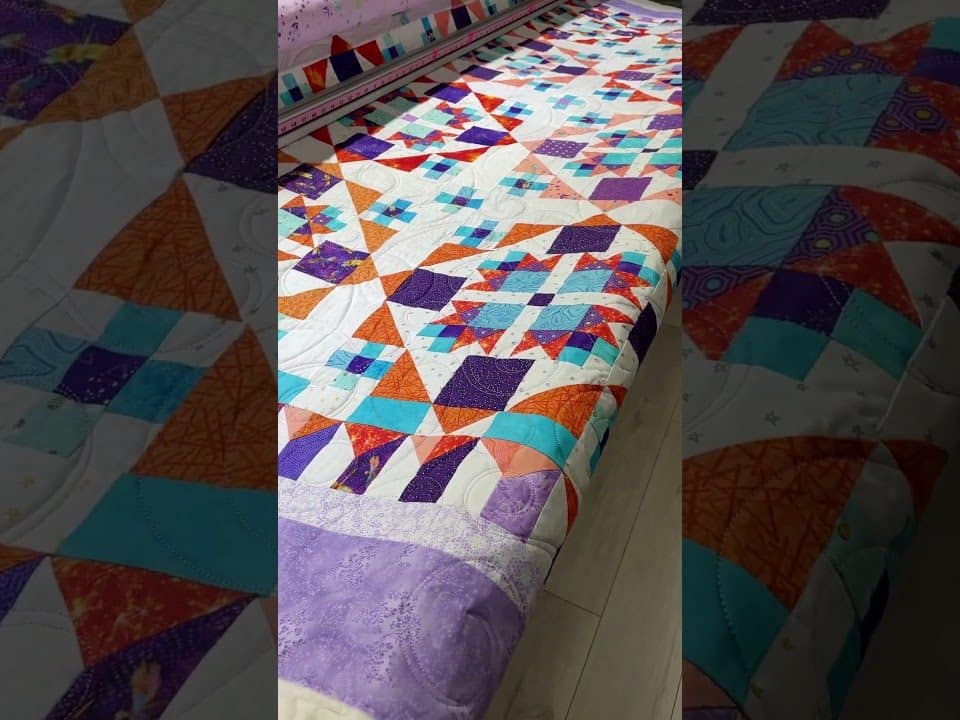 Dawn’s “Bonny Hunter Scrappy” quilt - Longarm quilted by Maynard Longarm Quilting