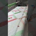 Esther’s “String” quilt - Longarm quilted by Maynard Longarm Quilting