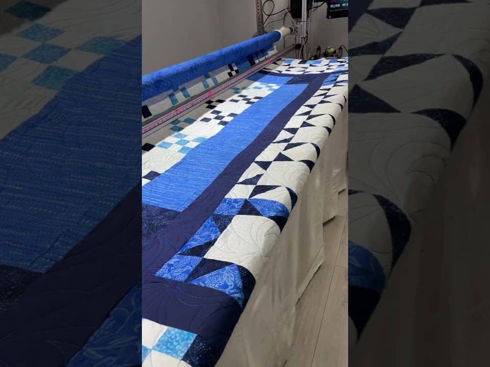 Judith’s “Blues” quilt - Longarm quilted by Maynard Longarm Quilting