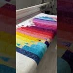 Barb’s “Color My World” quilt - Longarm quilted by Maynard Longarm Quilting
