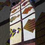Rose’s “African Ladies” quilt - Longarm quilted by Maynard Longarm Quilting