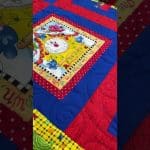 Beth’s “Mother Goose” quilt - Longarm quilted by Maynard Longarm Quilting