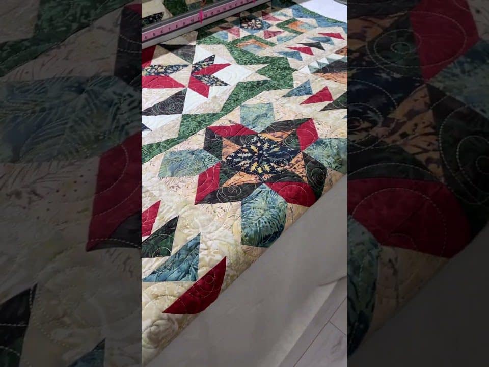 Gina’s “Stars with wide borders” quilt - Longarm quilted by Maynard Longarm Quilting