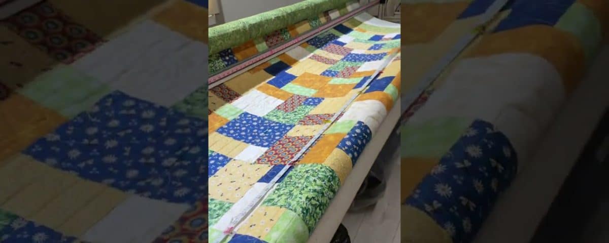 Carol’s “Scappy Squares” quit - Longarm quilted by Maynard Longarm Quilting