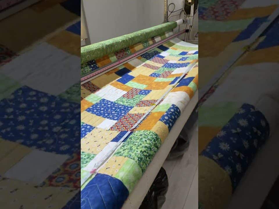 Carol’s “Scappy Squares” quit - Longarm quilted by Maynard Longarm Quilting