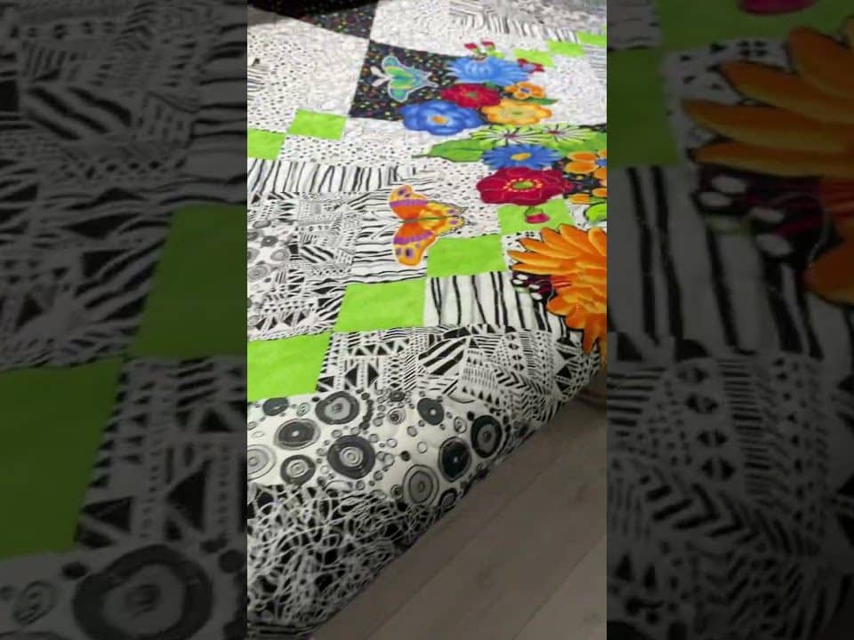 Beckie’s “Obsession” quilt - Longarm quilted by Maynard Longarm Quilting
