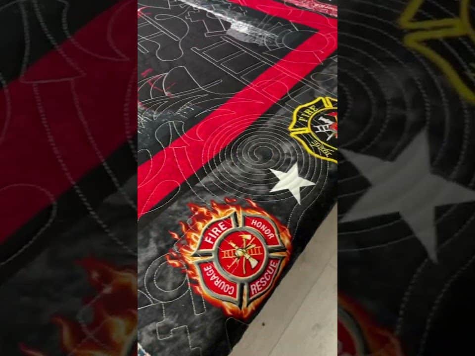 Donna’s “Fire fighter” quilt - Longarm quilted by Maynard Longarm Quilting