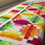 Barb’s “Fruity Log Cabin” Quilt - Longarm quilted by Maynard Longarm Quilting