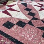 Beckie’s “Merry Mayhem” Quilt - Longarm quilted by Maynard Longarm Quilting