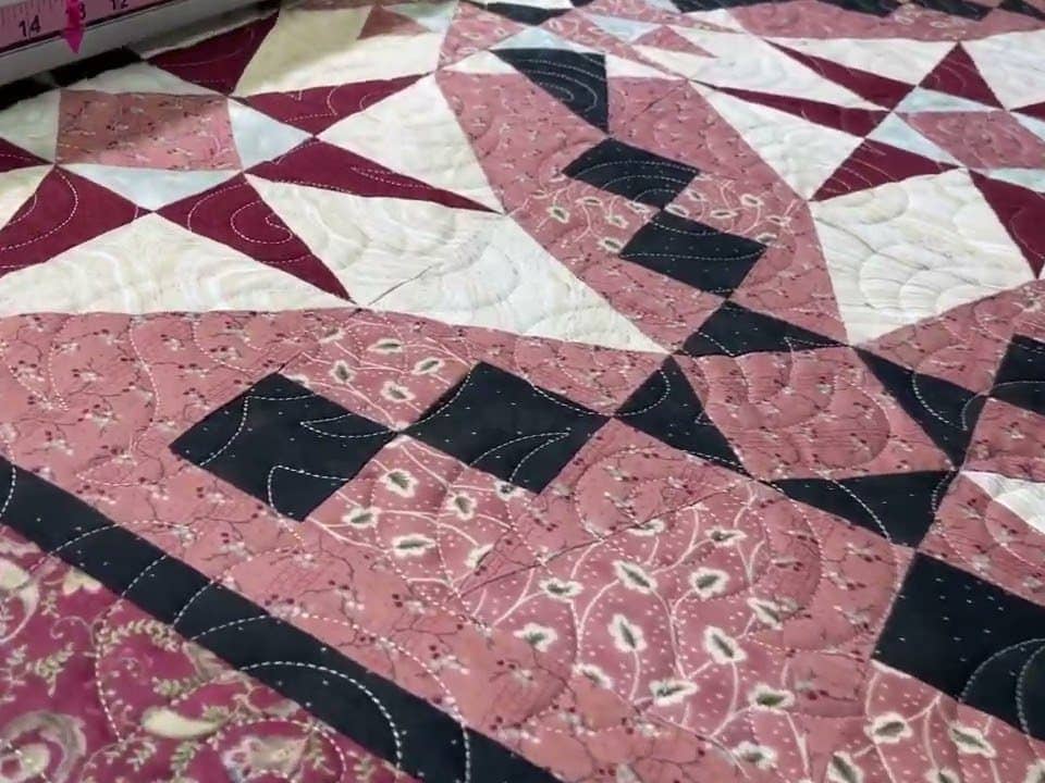 Beckie’s “Merry Mayhem” Quilt - Longarm quilted by Maynard Longarm Quilting