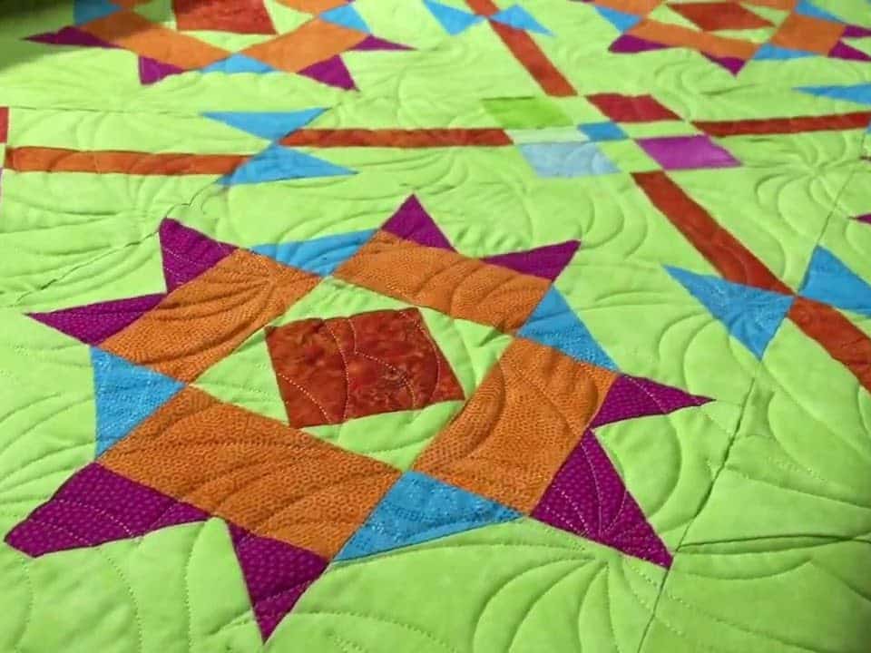 Kate’s “Utopia” quilt - Longarm quilted by Maynard Longarm Quilting