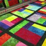 Barb’s “Botanical Brights” Quilt - Longarm quilted by Maynard Longarm Quilting