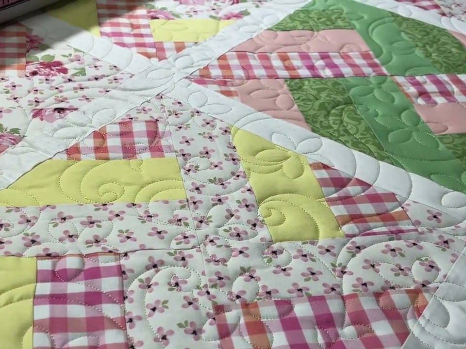 Jaimee’s “Baby Scrappy” quilt - Longarm quilted by Maynard Longarm Quilting