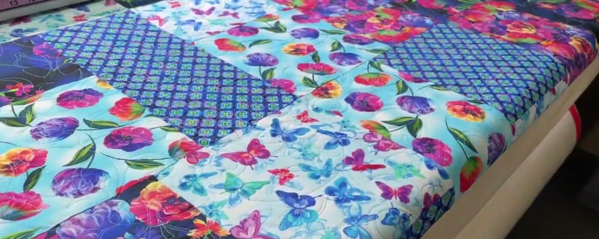Cathy’s “Sassy Tumble Block” quilt - Longarm quilted by Maynard Longarm Quilting