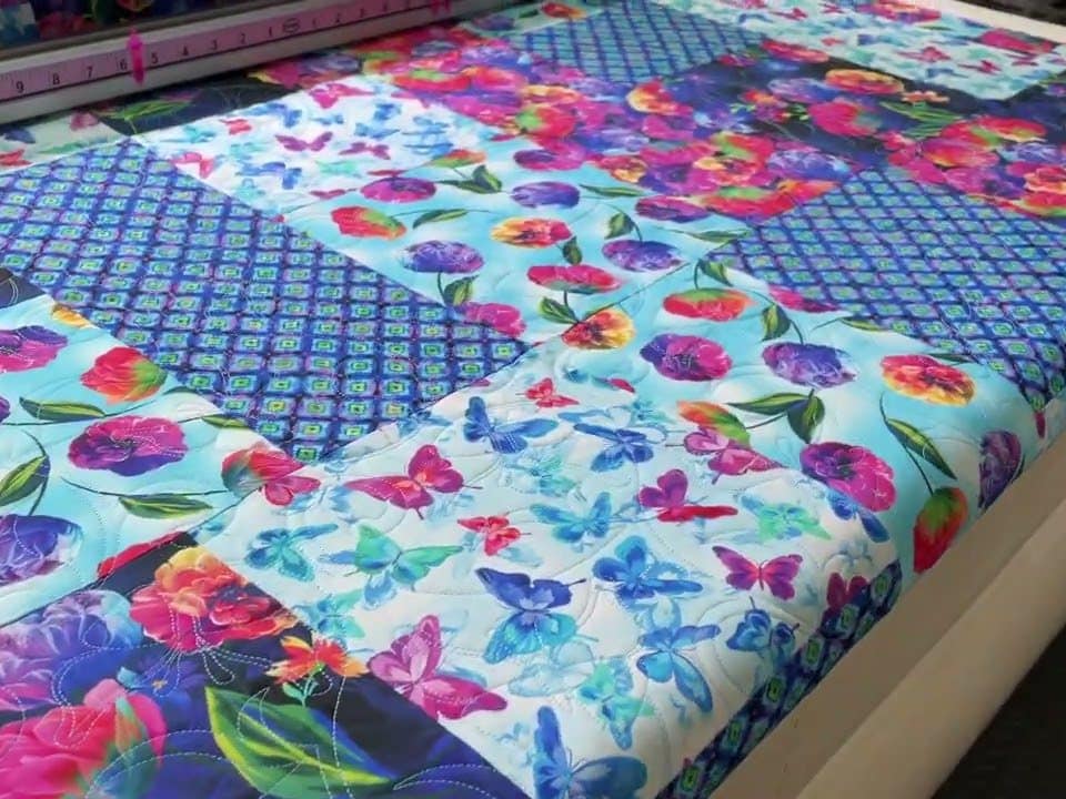Cathy’s “Sassy Tumble Block” quilt - Longarm quilted by Maynard Longarm Quilting