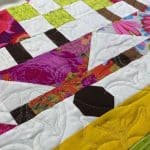 Rose’s “House & People” quilt - Longarm quilted by Maynard Longarm Quilting