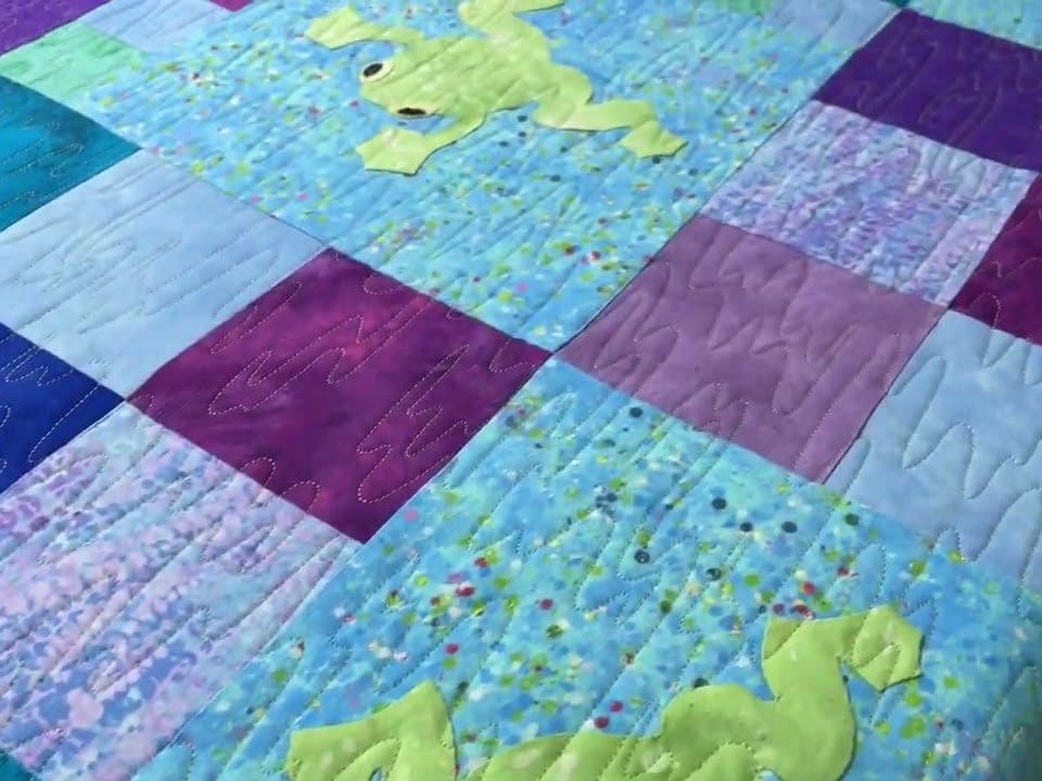 Barbara’s “Frog Pond” quilt - Longarm quilted by Maynard Longarm Quilting