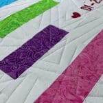 Hope’s “Anniversary” quilt - Longarm quilted by Maynard Longarm Quilting