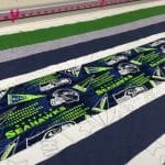 Lori’s “Seahawks” quilt - Longarm quilted by Maynard Longarm Quilting