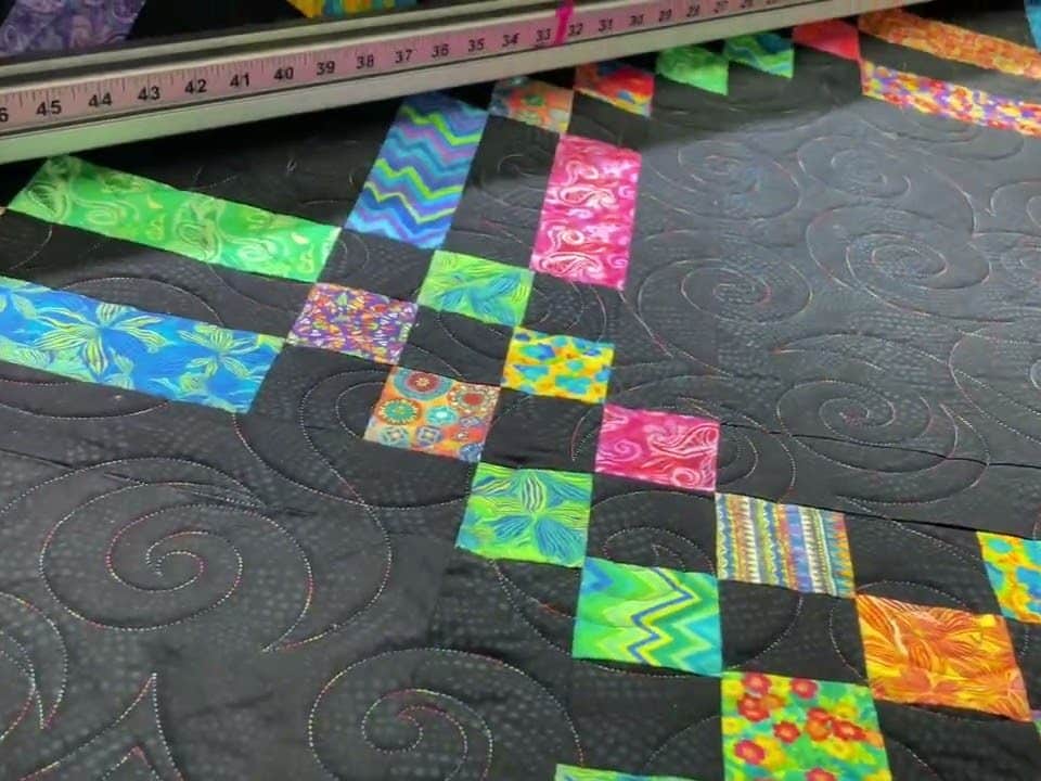 Marie’s “Watermark” quilt - Longarm quilted by Maynard Longarm Quilting