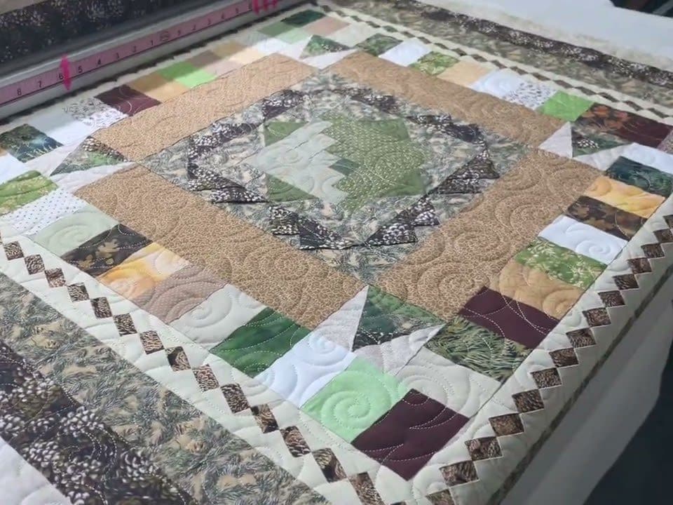 Eileen’s “Round Robin” quilt - Longarm quilted by Maynard Longarm Quilting