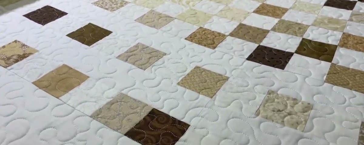 Cathy’s “Low-Volume Squares” quilt - Longarm quilted by Maynard Longarm Quilting