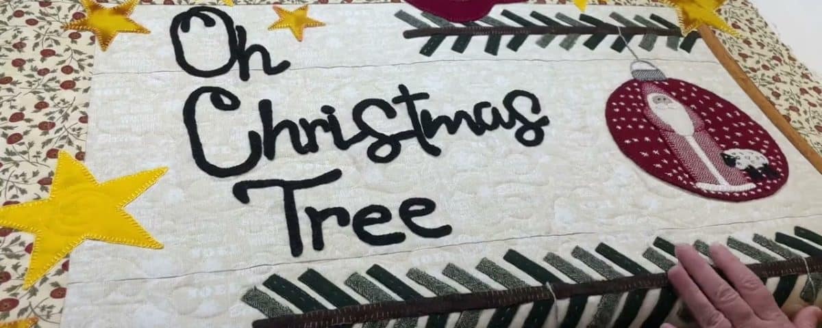 Brenda’s “Oh Christmas Tree” quilt - Longarm quilted by Maynard Longarm Quilting