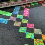 Marie’s “Watermark” quilt - Longarm quilted by Maynard Longarm Quilting
