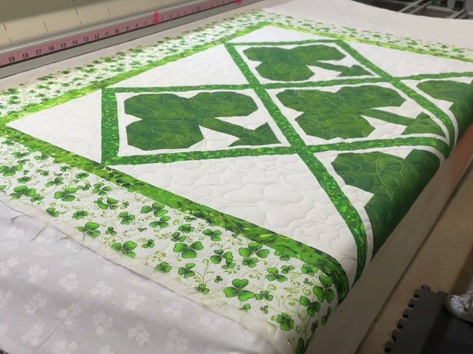 Eileen’s “St. Patrick’s” Wall hanging - Longarm quilted by Maynard Longarm Quilting
