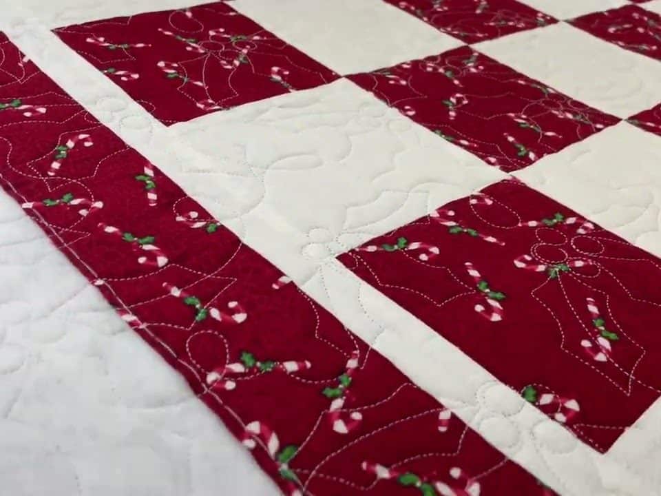 Cathie’s “Candy cane Christmas” quilts - Longarm quilted by Maynard Longarm Quilting