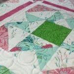 Edie’s “Coral Reef” quilt - Longarm quilted by Maynard Longarm Quilting