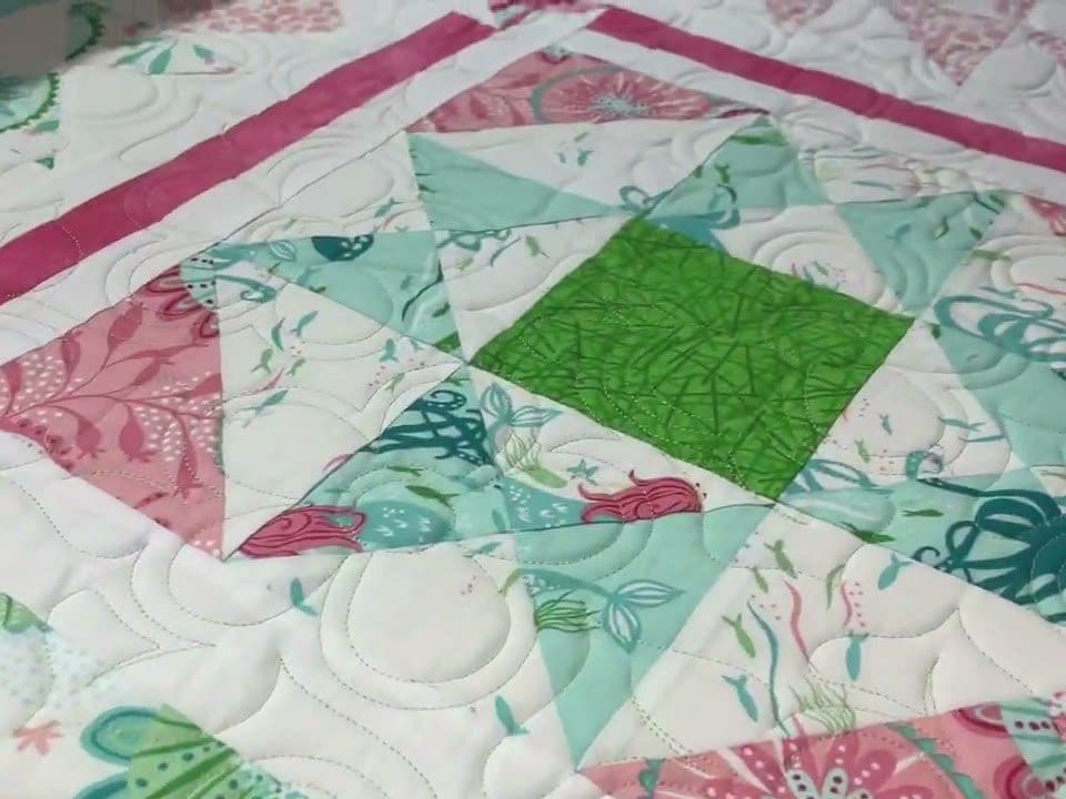 Edie’s “Coral Reef” quilt - Longarm quilted by Maynard Longarm Quilting