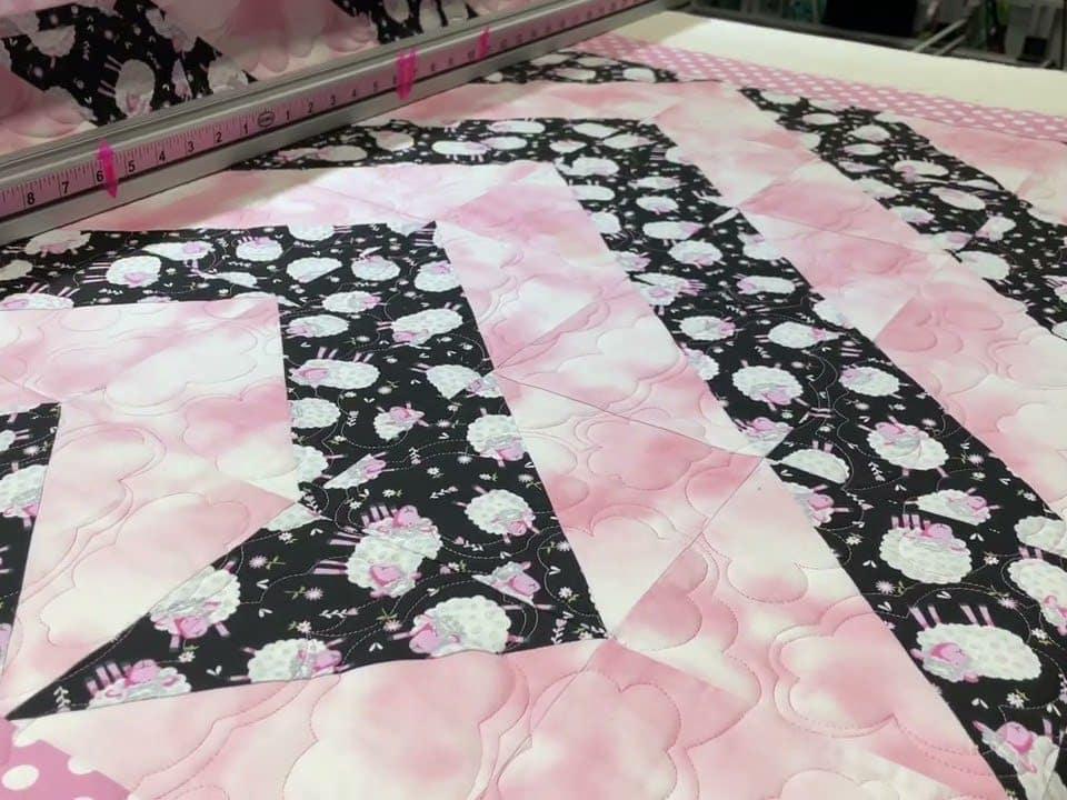 Eileen’s “Pink Lambs” baby quilt - Longarm quilted by Maynard Longarm Quilting