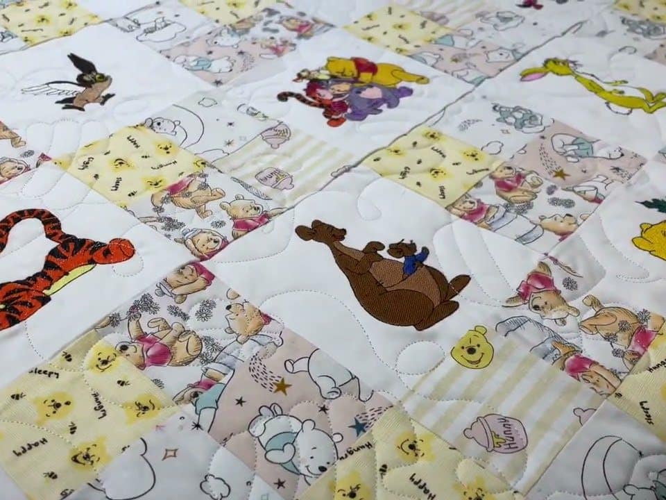 Thea’s “Baby Pooh” quilt - Longarm quilted by Maynard Longarm Quilting
